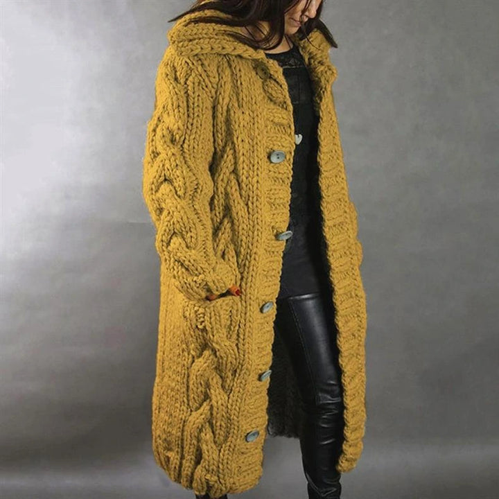 Hermine | Manteau long en grosse maille torsadée à capuche