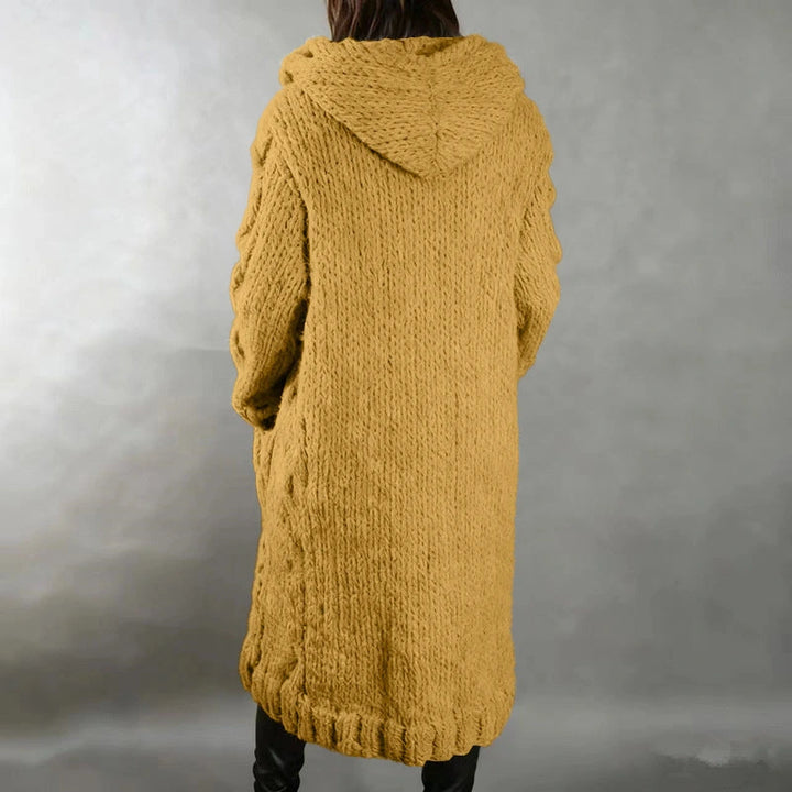 Hermine | Manteau long en grosse maille torsadée à capuche