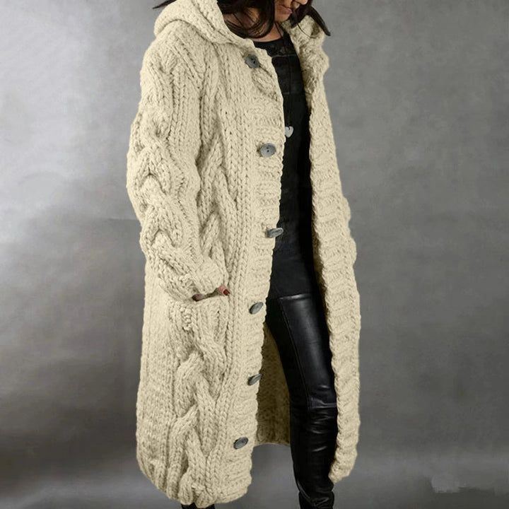 Hermine | Manteau long en grosse maille torsadée à capuche