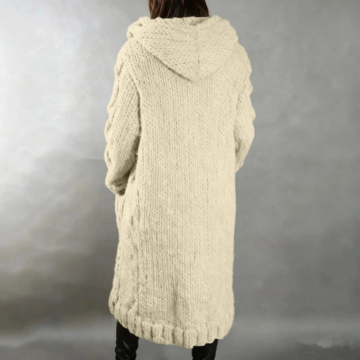 Hermine | Manteau long en grosse maille torsadée à capuche