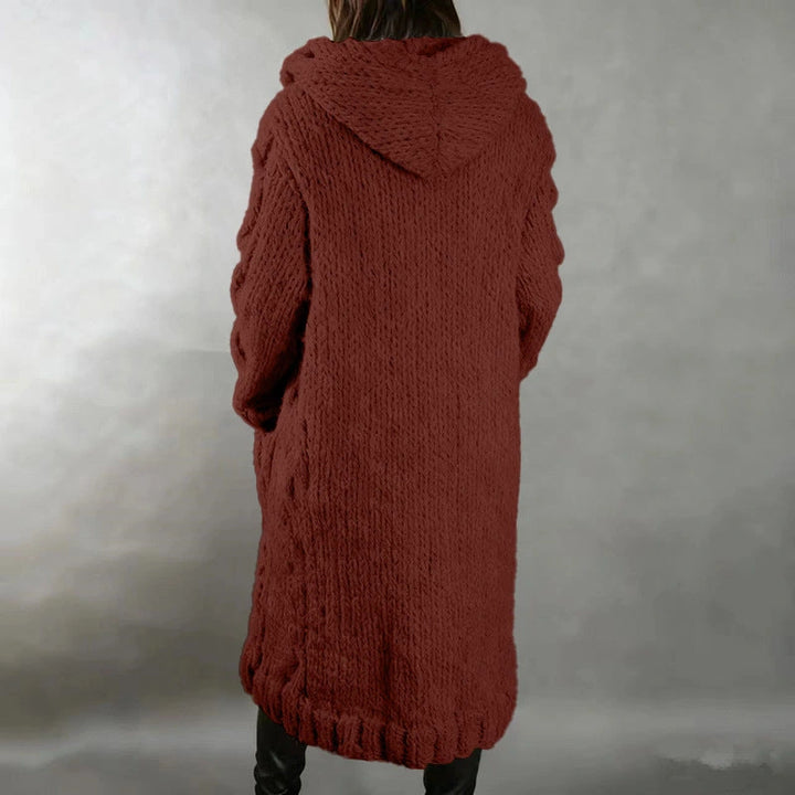 Hermine | Manteau long en grosse maille torsadée à capuche