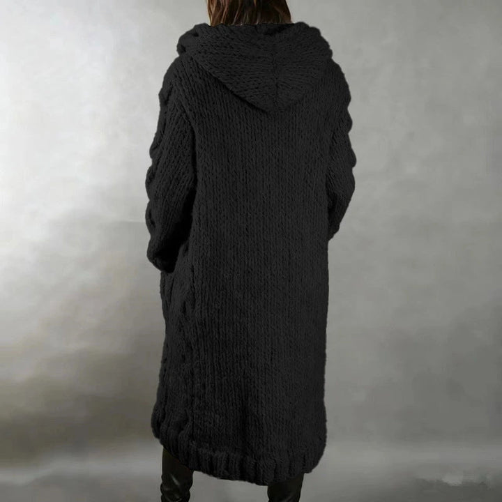 Hermine | Manteau long en grosse maille torsadée à capuche